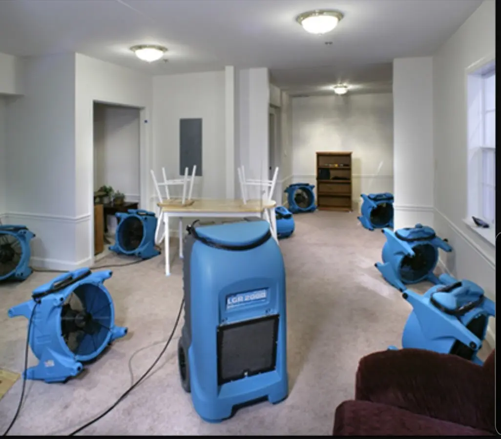 Air movers and dehumidifier setup for Water Damage Restoration in Stewartville